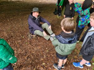 Children enjoying outdoor activities at Inchmarlo estate in Scotland.