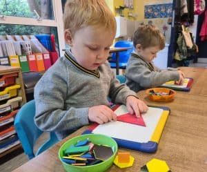 Children engaging in classroom activities at Inchmarlo early learning center.