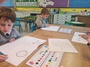 Children engaging in classroom activities at Inchmarlo.