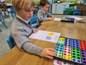 Children engaging in educational activities at Inchmarlo School, fostering learning and development.