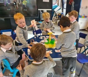 Children engaging in educational arts and crafts at Inchmarlo.