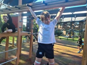 Children enjoying outdoor play at Inchmarlo School playground.