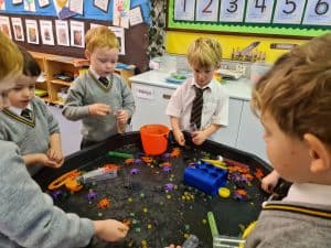 Children playing in a classroom at Inchmarlo early years center.