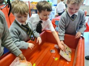 Children engaging in classroom activities at Inchmarlo School in a vibrant learning environment.