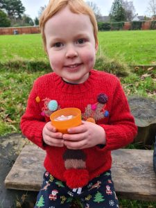 Children enjoying outdoor activities at Inchmarlo estate in Scotland.