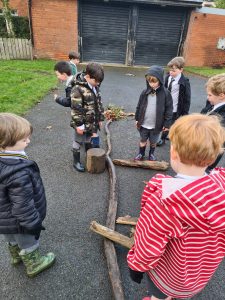 Children playing outdoors at Inchmarlo school.