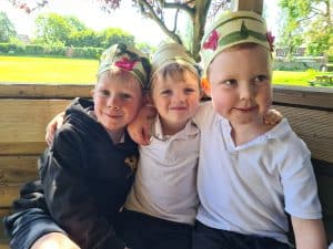 Group of children enjoying outdoor play at Inchmarlo Estate in Scotland.