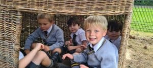Children playing outdoors at Inchmarlo school.