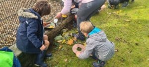 Children gardening at Inchmarlo estate, outdoor learning, family nature activities.