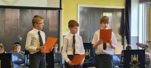 Students participating in a classroom activity at Inchmarlo.