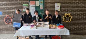 Students selling homemade goods at Inchmarlo event.