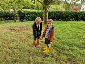 Children playing outdoors at Inchmarlo estate in Aberdeenshire.