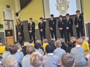 Young students receiving awards at Inchmarlo school event.