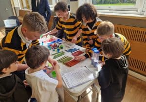 Children engaging in educational activities at Inchmarlo school.