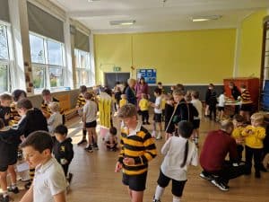 Children playing in a bright, spacious classroom at Inchmarlo pre-school facility.