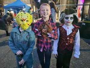Children in costumes at Inchmarlo event, enjoying fun activities and festivities.