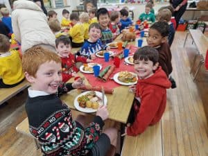 Children enjoying a school meal at Inchmarlo preschool.