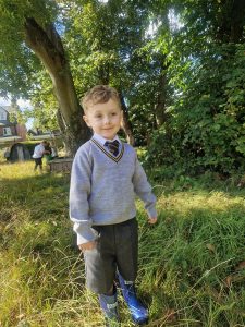 Children enjoying outdoor play at Inchmarlo estate in Scotland.