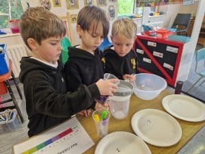 Kids engaging in fun classroom activity at Inchmarlo School.