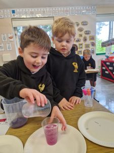 Children engaging in creative arts at Inchmarlo preschool.