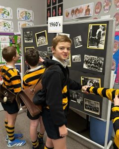 Primary school students exploring Inchmarlo history exhibit.