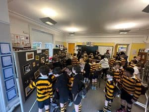 Students exploring learning activities in a classroom setting.