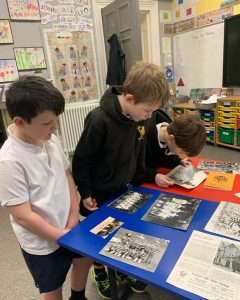 Students exploring Inchmarlo heritage and history in a classroom setting.