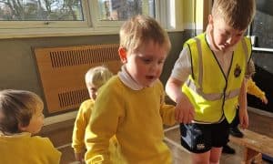 Children participating in educational activity at Inchmarlo school.