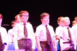 Students performing on stage at Inchmarlo School in Aberdeenshire.