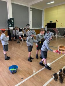 Children participating in school activities indoors.