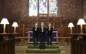 Interior of Inchmarlo chapel with church members during a service.
