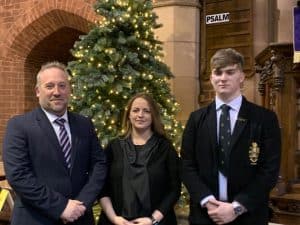 Elegant Inchmarlo event with well-dressed guests at Christmas celebration.