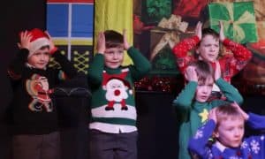 Children celebrating Christmas at Inchmarlo resort.