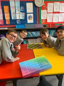 Students engaging in classroom activities at Inchmarlo School, focusing on learning and development.