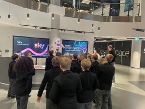 Elegant indoor event at Inchmarlo with guests attending a fashion show.