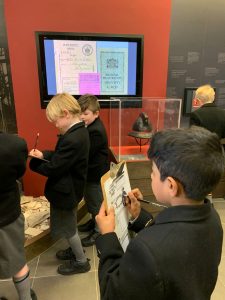 Students exploring Inchmarlo heritage site and educational exhibits.