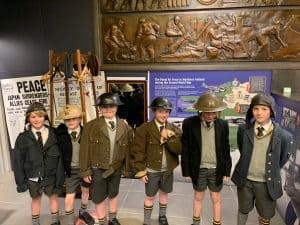 Children exploring museum exhibits at Inchmarlo, showcasing local history and educational activities.