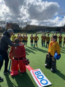 Kids and coaches playing rugby at Inchmarlo sports ground in Scotland.