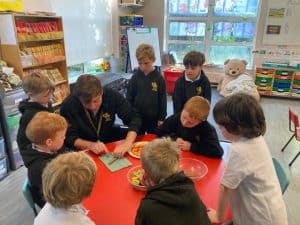 Children engaging in educational activities at Inchmarlo nursery.
