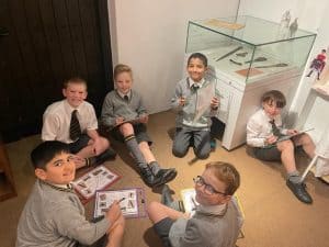 Children engaging in educational activities at Inchmarlo School.