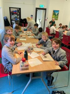 Children enjoying hands-on activities at Inchmarlo day nursery.
