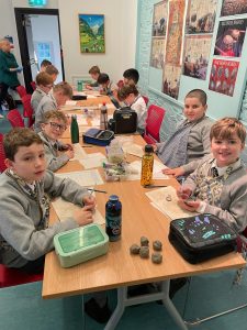 Children engaged in a creative activity at Inchmarlo. Modern learning environment for young students.