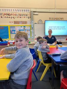 Students engaging in interactive learning activities at Inchmarlo School.