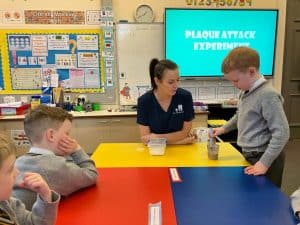 Engaging students in STEM experiments at Inchmarlo educational center.