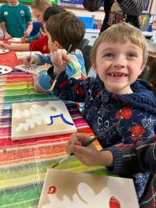 Children engaging in arts and crafts at Inchmarlo early learning center.