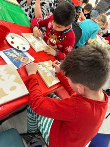 Children enjoying holiday activities at Inchmarlo, focusing on engaging fun and festive atmosphere.