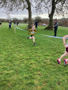 Children running race at Inchmarlo golf course in Scotland.