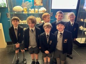 Young students in school uniforms at Inchmarlo, a historic educational institution in Scotland.