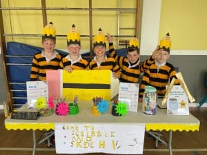 Children dressed as bees at Inchmarlo School fundraising event.