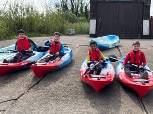 Outdoor kayaking at Inchmarlo, Scotland, perfect for family fun and outdoor adventures.